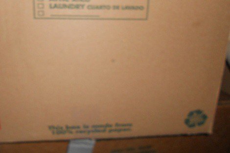 Boxes sorted for keep, donate, and trash during decluttering